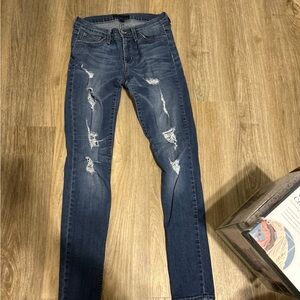 Women’s distressed skinny jeans